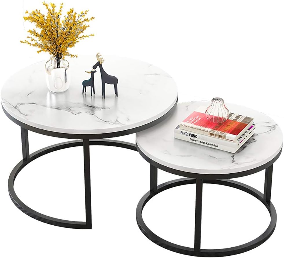 Two-piece nesting round table with a marble top and black metal frame